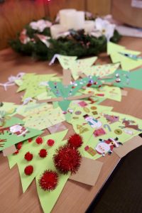 Some of the students' finished door tags. (Sun photo | Chuck Wainwright)