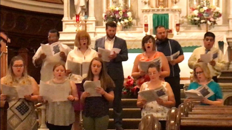 Utica concert draws standing ovation