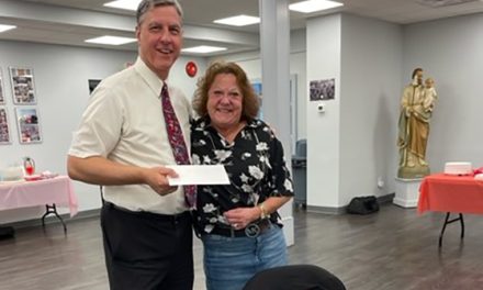 Deacon honored for service to Rome community