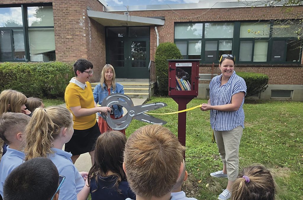 Holy Family School, Norwich, blesses new Free Little Library,  fostering community literacy