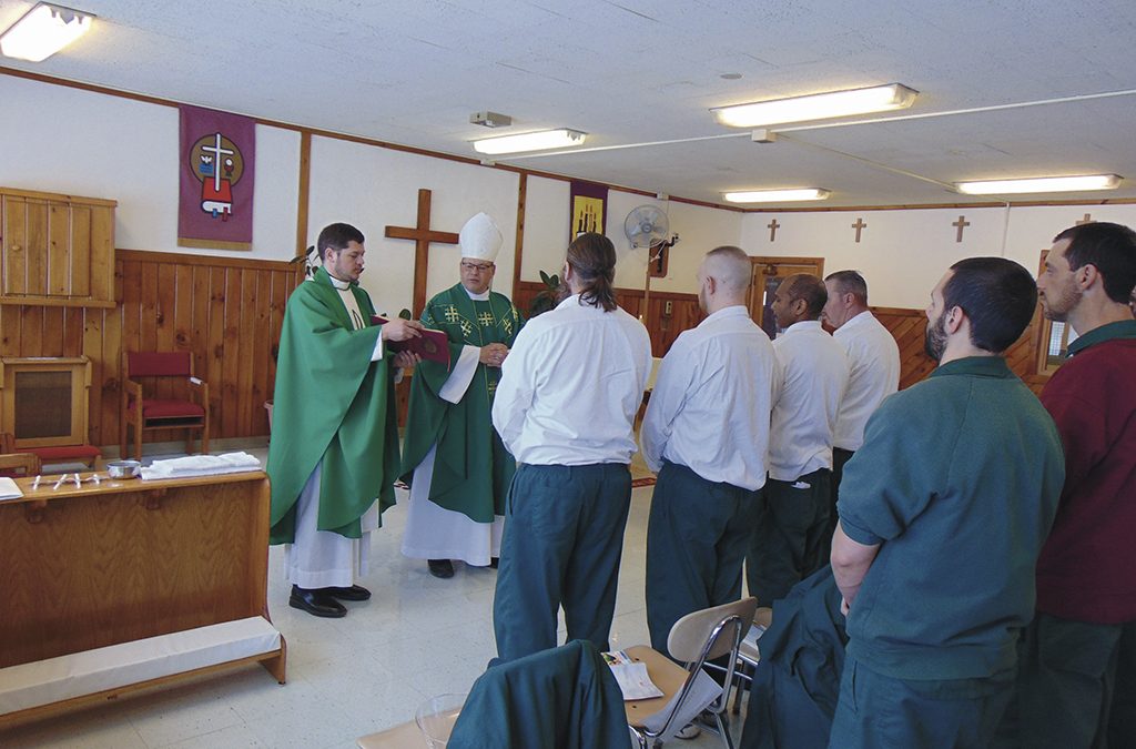 Four men baptized, confirmed during Bishop’s visit to correctional facility