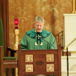 Father David McCallum, S.J., of Le Moyne College speaks March 16 at the Mass at the Cathedral of the Immaculate Conception in Syracuse. (Sun photo | Chuck Wainwright)